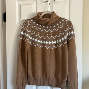 Camel  and White Turtleneck Sweater
With geometric pattern.